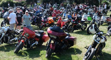 Scunthorpe, Lincolnshire, UK. August 2025. Warlock motorcycle club annual show with music, characters, cars and bikes. Vintage and modern. Customised and renovated.