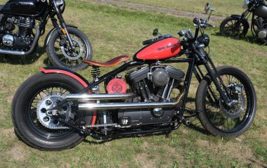 Scunthorpe, Lincolnshire, UK. August 2025. Warlock motorcycle club annual show with music, characters, cars and bikes. Vintage and modern. Customised and renovated.