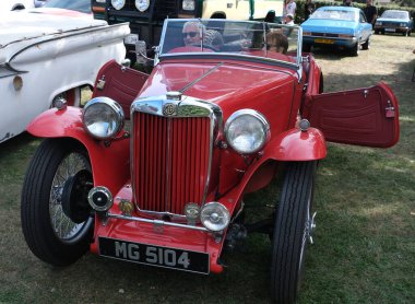 Scunthorpe, Lincolnshire, UK. August 2025. Warlock motorcycle club annual show with music, characters, cars and bikes. Vintage and modern. Customised and renovated.