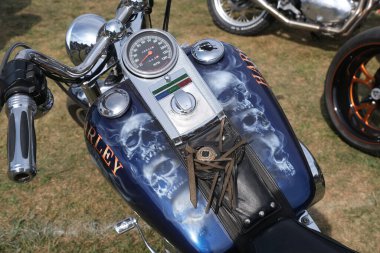 Scunthorpe, Lincolnshire, UK. August 2025. Warlock motorcycle club annual show with music, characters, cars and bikes. Vintage and modern. Customised and renovated.