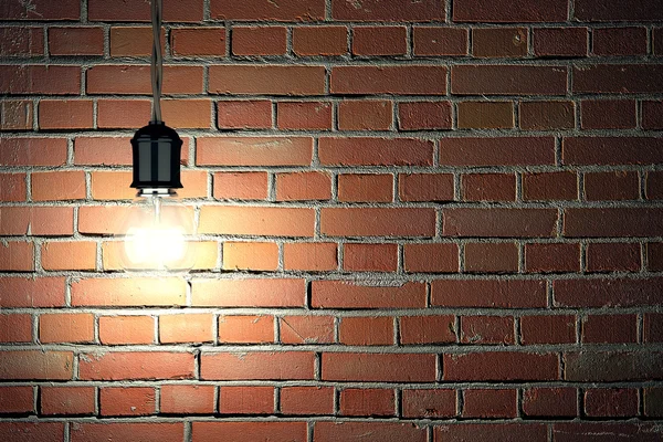 Light Bulb On Brick Wall — Stock Photo, Image