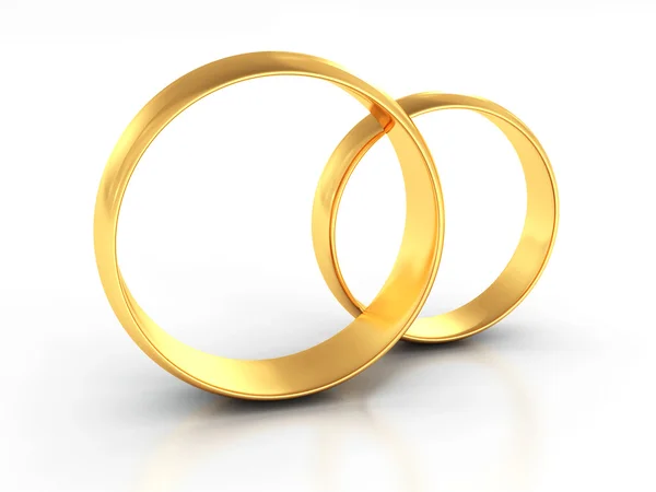 Pár zlatých snubních prstenů — Stock fotografie