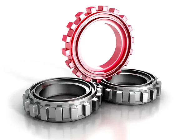 Engranajes de tres ruedas dentadas con líder rojo —  Fotos de Stock