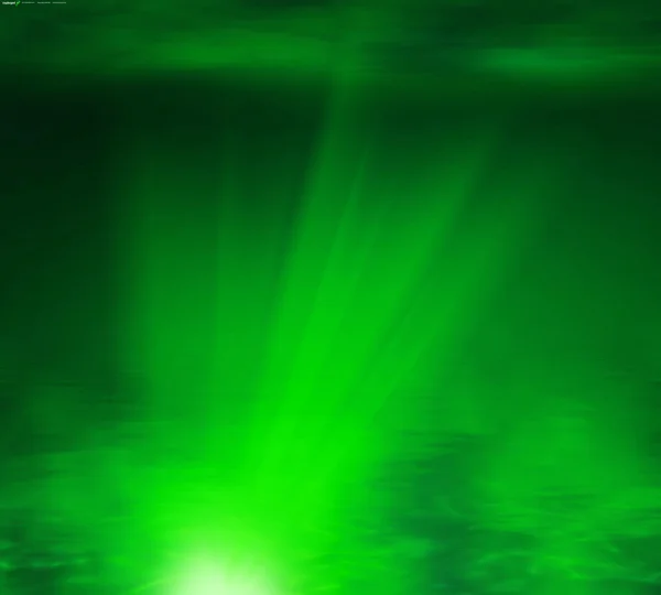 Abstrakt grön strålar ljus bakgrund — Stockfoto