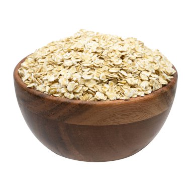 Beyaz arka planda yulaf ezmesi var..