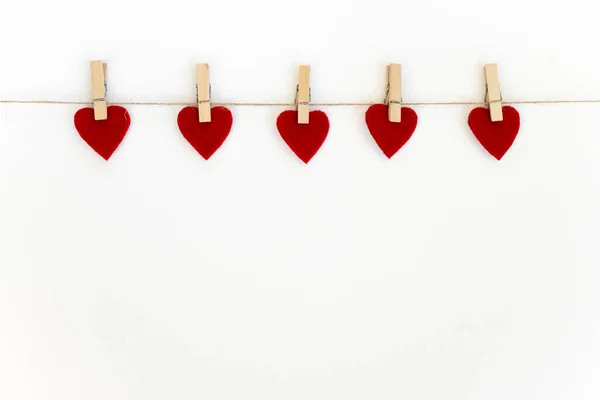 White Background Three Red Hearts Clothespins Valentine Day Card — Stock Photo, Image