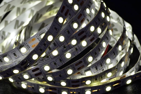 Glowing in the dark LED strip on a dark background.