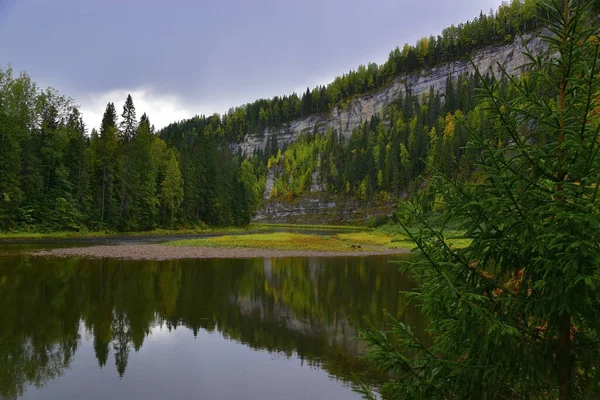 The majestic gypsum stone massif Usvinskie Stolby among the Ural forests on the right bank of the Usva River in the Gremyachinsom region of the Perm Territory.