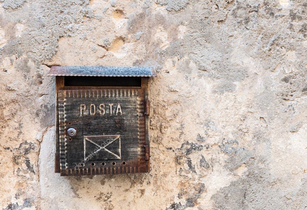 Old mailbox with ancient logo and copy space