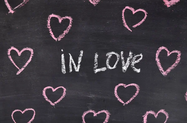 In Love. Abstract background is in the hearts. Chalk painted. Background for Valentine's Day. — Stock Photo, Image