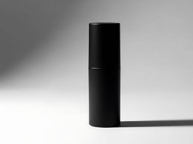 Düz Arkaplanda Minimalist Siyah Silindir Nesnesi