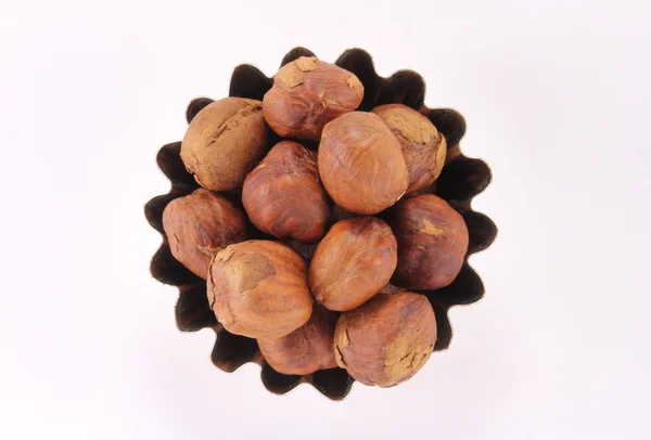 Handful hazelnuts in figured form — Stock Photo, Image