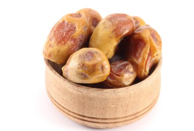 Ahşap bir yuvarlak şekil içinde taş olan tarihleri 