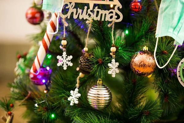 Christmas tree decorations and masks. Abstract and background scene.