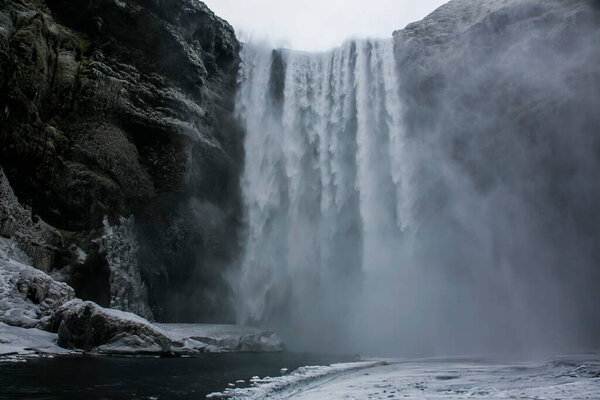 Winter landscape in Skogafoss waterfall, Iceland, Northern Europe.
