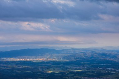 Spring sunset in Santuari Mare De Deu Del Mont peak, La Garrotxa, Spain.
