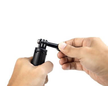 Boş alanı olan iki el tripodu tutuyor. Beyaz arka planda izole edilmiş. kırpma yolları ile.