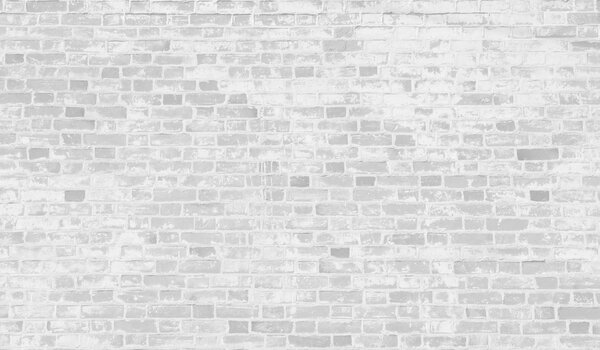 Faded white brick wall background.