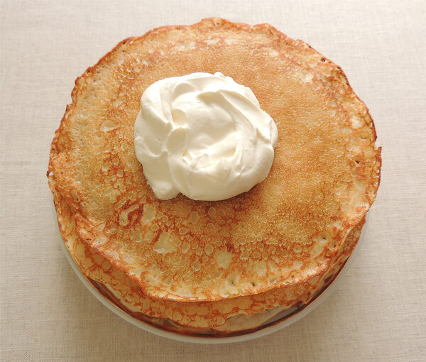 Pancakes with sour cream baked on Shrovetide Royalty Free Stock Images