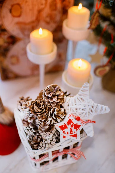 Cones and candles in the New Year composition — Stock Photo, Image