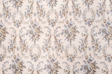 Çiçek desenli eski bir duvar kâğıdı.