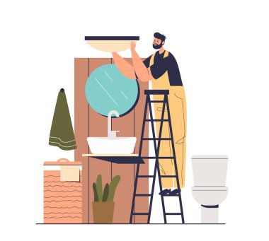 Banyoda çalışan elektrikçi küvetin içini yeniledikten sonra yeni lamba monte ediyor.