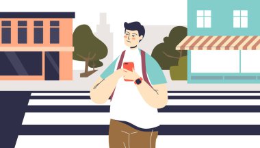 Yaya geçidinde karşıdan karşıya geçen genç adam elinde akıllı telefonla mesaj yazıyor.