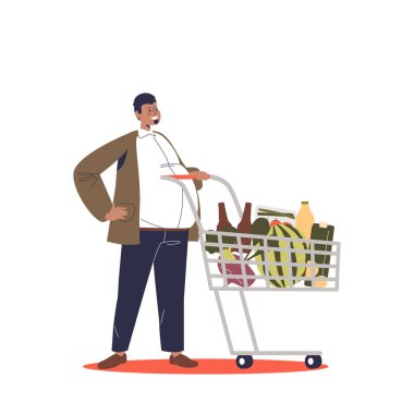 Market ürünleriyle dolu alışveriş arabası olan bir adam marketten yiyecek alıyor. Erkek alışverişçi alışveriş yapıyor.