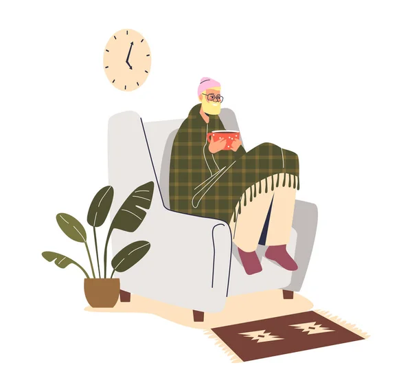 Παγωμένος άντρας κάθεται στην πολυθρόνα στο σπίτι κάτω από την κουβέρτα φοράει καπέλο σε εσωτερικούς χώρους ζεσταίνοντας τα χέρια σε ζεστό φλιτζάνι — Διανυσματικό Αρχείο