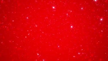 Narin kar taneleri parlak kırmızı bir zemine doğru sürükleniyor ve parıldıyor, canlı ve neşeli bir atmosfer yaratıyor kış şenliklerini kutlamak için mükemmel..