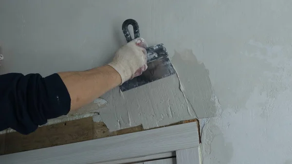 Gloved Hand Repairman Applies Layer Elastic Finishing Plaster Wall Door — Stock Photo, Image