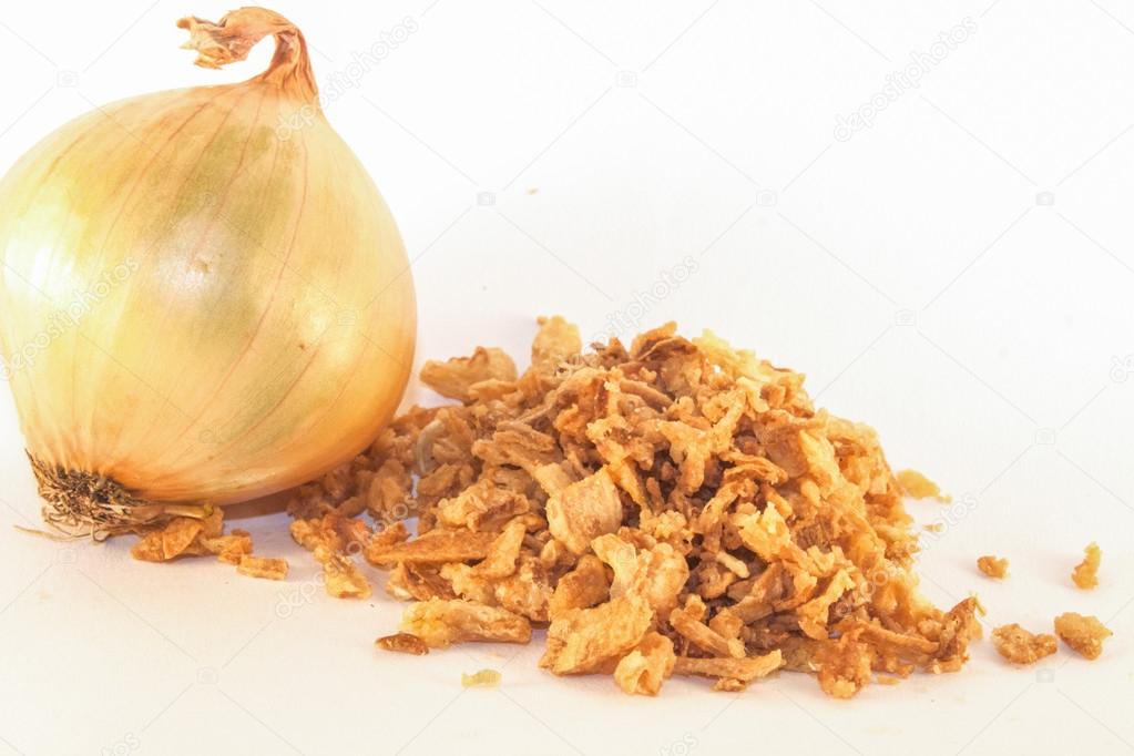 Dry onion flakes and a onion