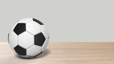 Ahşap masa tahtasının ortasında dönen gerçekçi futbol topu. Video düzenleme için izole edilmiş dönen bir futbol topu görüntüsü. Metnini kopyala. Model yap, spor takımı golü. 3d biçimlendir