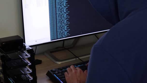 Hacker Man Writes Blue Code Attack Program Virus Your Computer — Stock Video