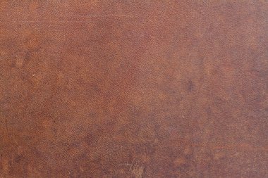 Doğal kahverengi eski eyer derisinin benekli arka planı