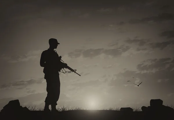 Silhouet van een terrorist met een wapen — Stockfoto