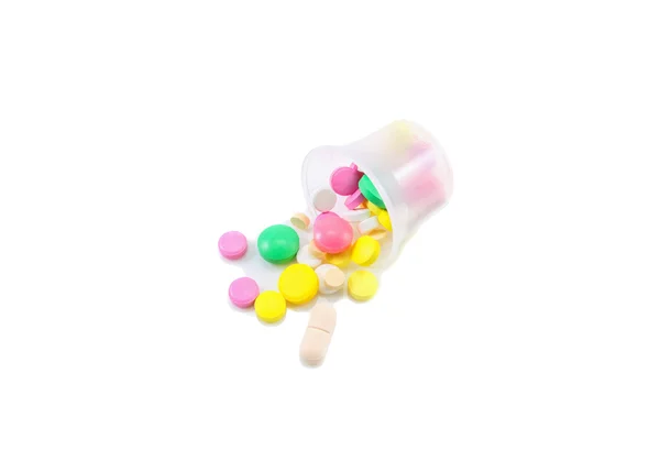 Conjunto de comprimidos num recipiente de plástico — Fotografia de Stock