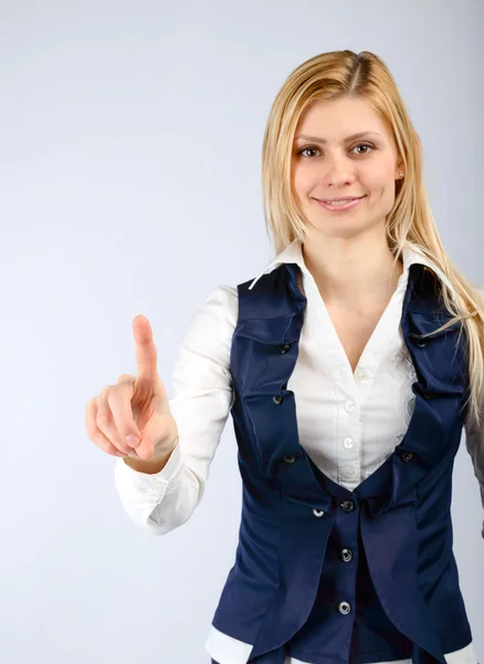 Business woman showing a finger gesture attention — Stock Photo, Image
