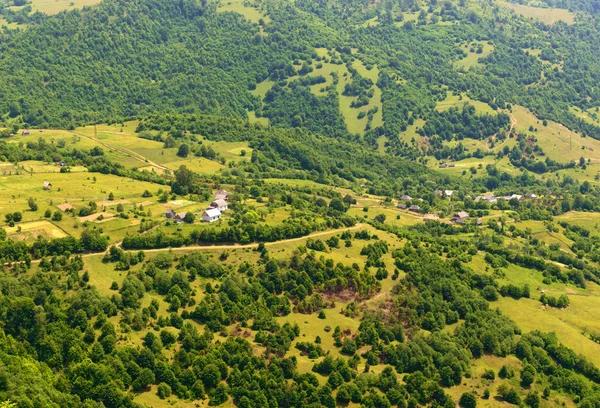 Mountain valley on a background of cloudy sky — Stock Photo, Image