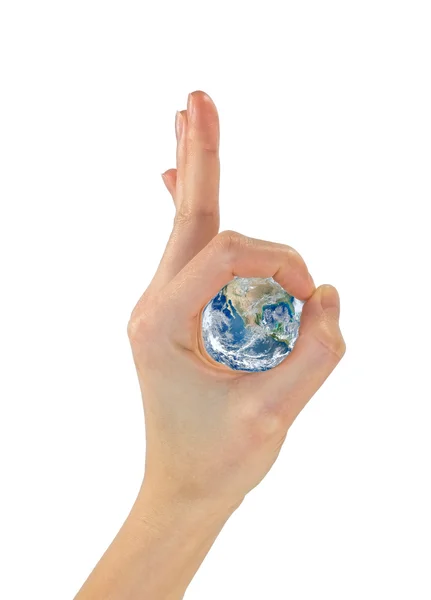 Χειρονομία χέρια εντάξει και ο πλανήτης γη στο κέντρο. NASA — Φωτογραφία Αρχείου