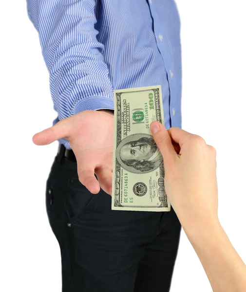 Hand gives money to a man's hand — Stock Photo, Image