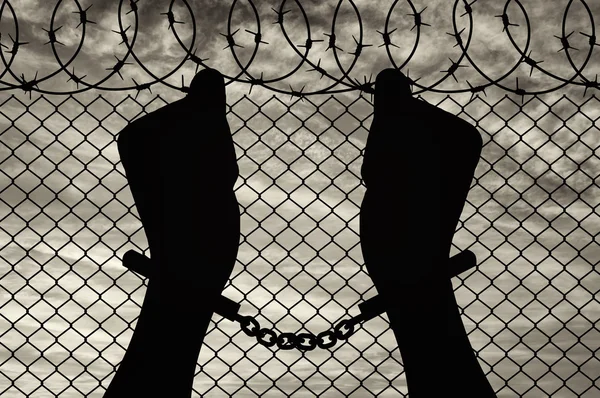 İnsan eli kelepçeli silüeti