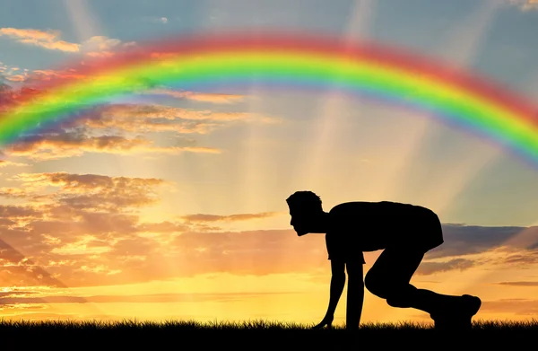 Startläufer auf Regenbogenhintergrund — Stockfoto