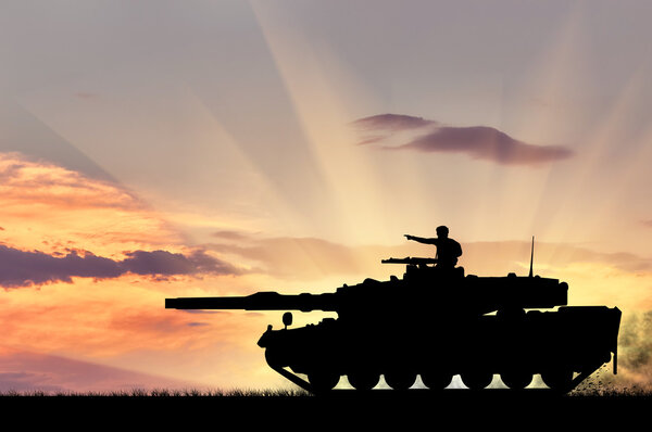 Silhouette of a tank with a soldier