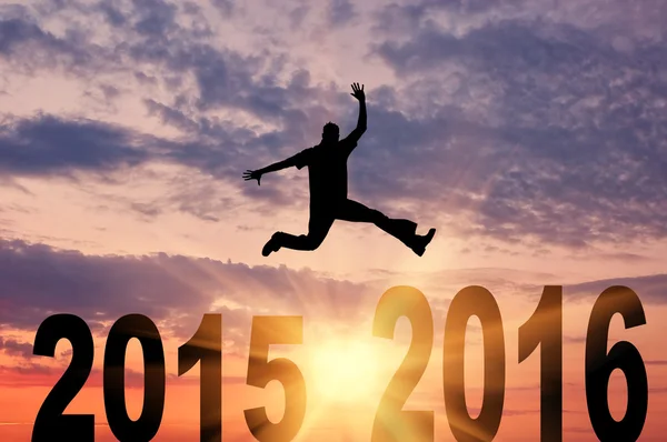 Man in a jump between 2015 and 2016 years — Stock Photo, Image