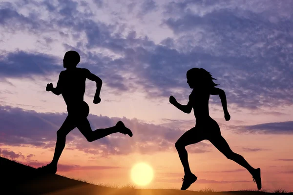 Silhouette men and women runners-up — Stock Photo, Image