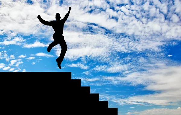점프 하는 행복 한 사업가의 실루엣 — 스톡 사진