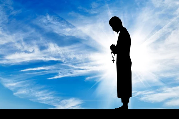 Silhouette of a priest — Stock Photo, Image