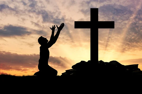 Silhouette of man praying — Stock Photo, Image