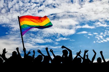 Bir geçit töreni gey ve lezbiyenlerin silüeti